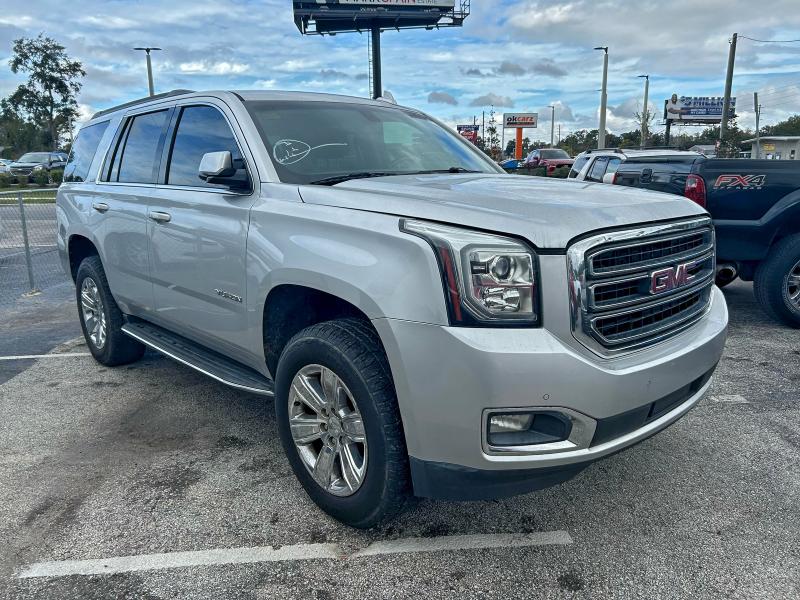 GMC YUKON SLE 2017 with VIN 1GKS1AKC6HR329624 - Photo from auction