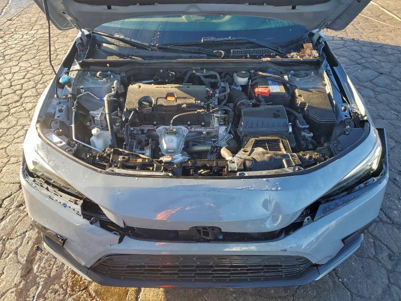 Photo 11 from auction – 2023 HONDA CIVIC SPOR with VIN 2HGFE2F52PH530035