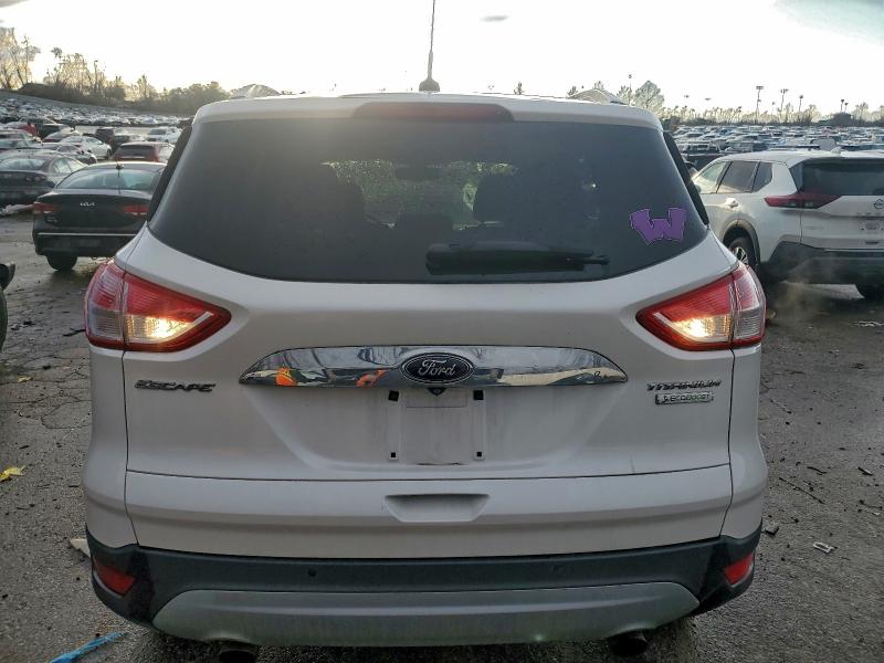 Photo 6 from auction – 2015 FORD ESCAPE TIT with VIN 1FMCU0JX4FUB60313