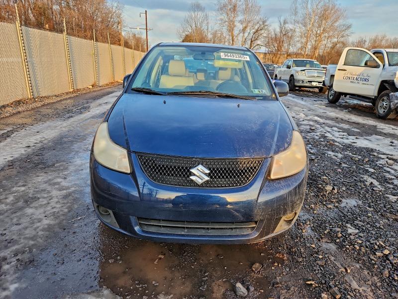 Photo 5 from auction – 2010 SUZUKI SX4 LE with VIN JS2YC5A26A6300847