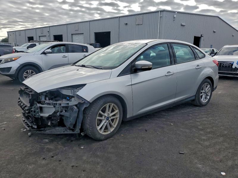 FORD FOCUS SE 2017 with VIN 1FADP3F21HL221372 - Photo from auction