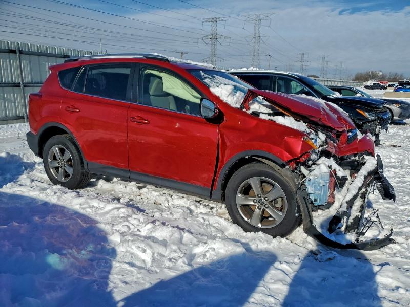 Photo 4 from auction – 2015 TOYOTA RAV4 XLE with VIN JTMRFREV9FJ014240