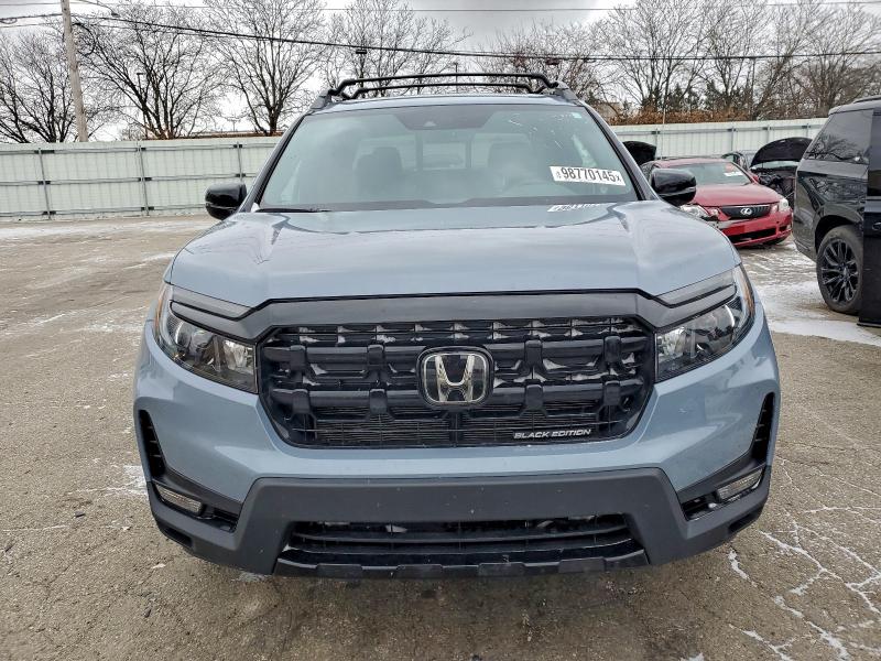 Photo 5 from auction – 2024 HONDA RIDGELINE with VIN 5FPYK3F8XRB012898