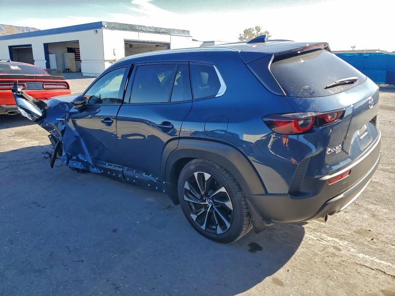 Photo 2 from auction – 2025 MAZDA CX-50 PREM with VIN 7MMVAAEW3SN104042