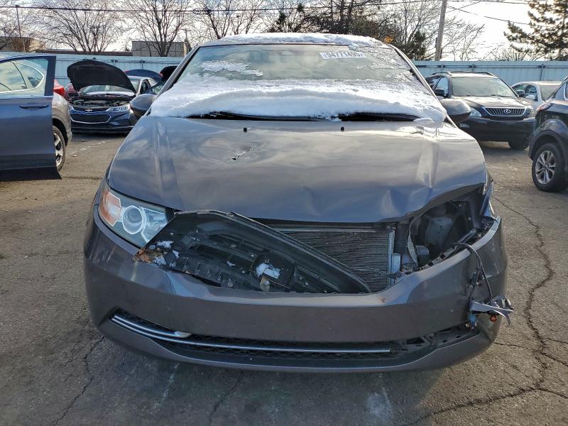 Photo 5 from auction – 2014 HONDA ODYSSEY with VIN 5FNRL5H60EB095673