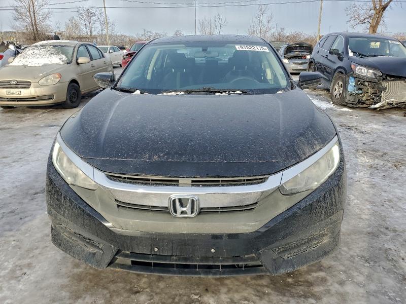 Photo 5 from auction – 2018 HONDA CIVIC with VIN 2HGFC2F50JH009179