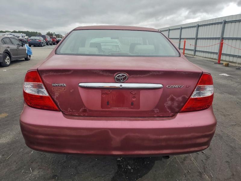 Photo 6 from auction – 2002 TOYOTA CAMRY LE with VIN JTDBE32K620071961