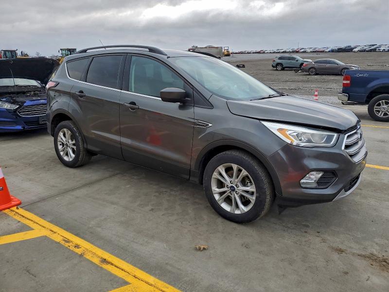 Photo 4 from auction – 2017 FORD ESCAPE SE with VIN 1FMCU0GD4HUD26314
