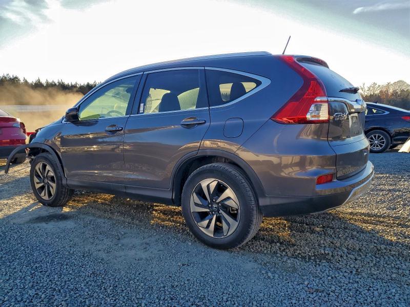Photo 2 from auction – 2015 HONDA CR-V TOURI with VIN 5J6RM4H98FL069641