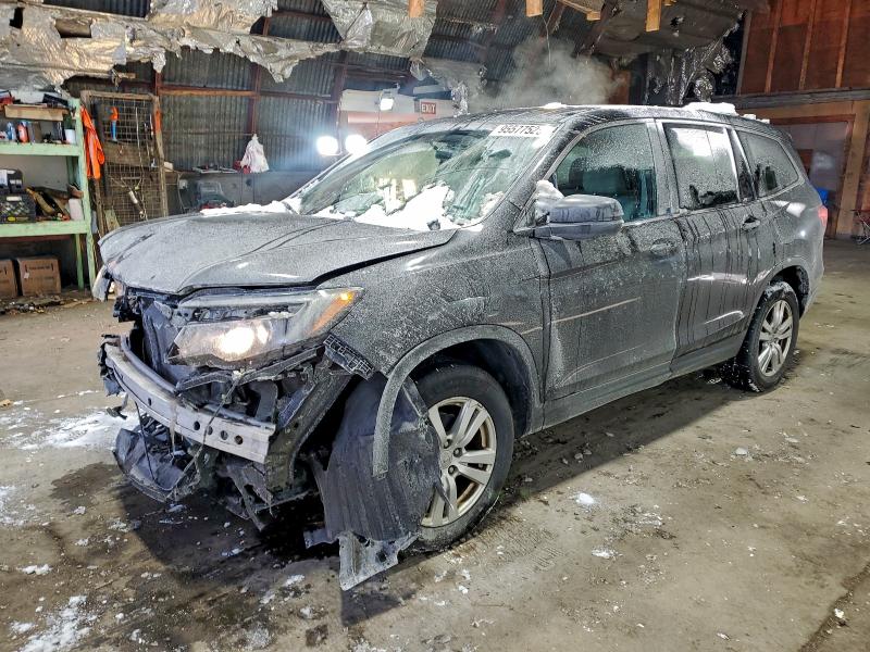 HONDA PILOT LX 2017 with VIN 5FNYF6H14HB015194 - Photo from auction