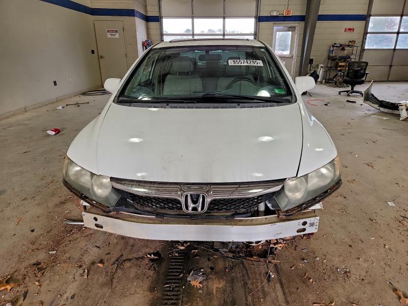 Photo 5 from auction – 2011 HONDA CIVIC EX with VIN 19XFA1F86BE001707