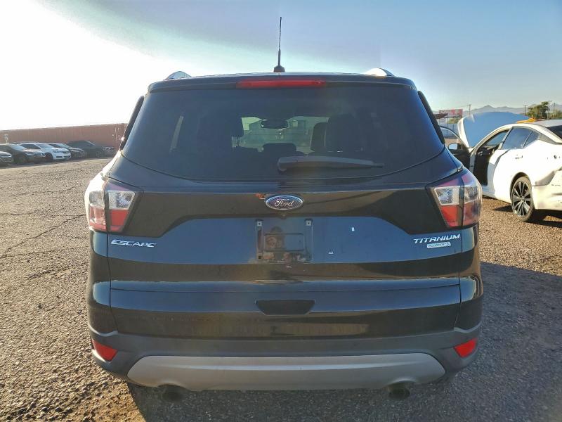 Photo 6 from auction – 2017 FORD ESCAPE TIT with VIN 1FMCU0JD5HUE43358