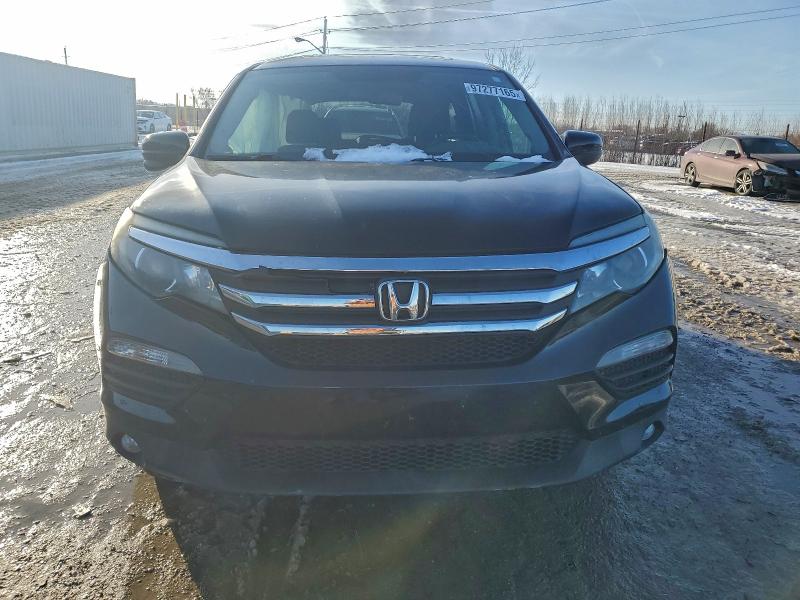 Photo 5 from auction – 2016 HONDA PILOT EXL with VIN 5FNYF6H55GB101082