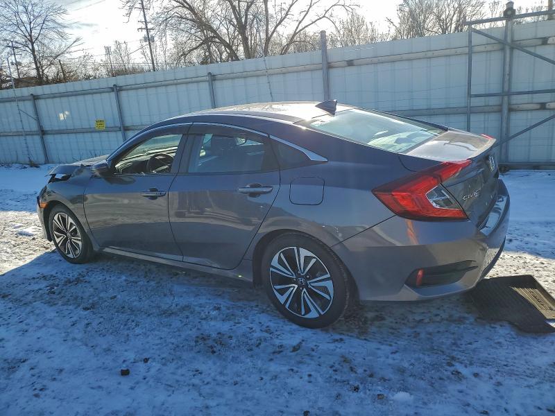 Photo 2 from auction – 2017 HONDA CIVIC EX with VIN 19XFC1F37HE021861