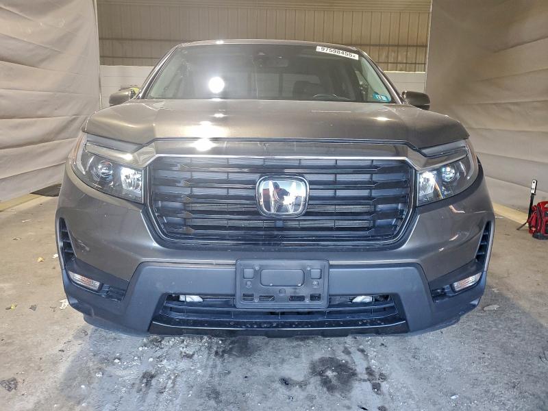 Photo 5 from auction – 2022 HONDA RIDGELINE with VIN 5FPYK3F74NB024384