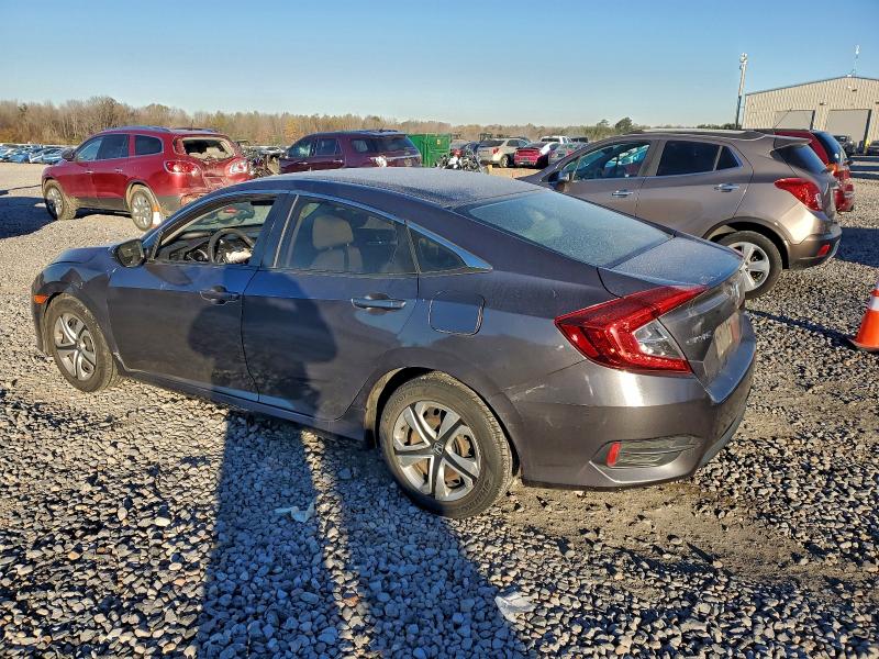 Photo 2 from auction – 2016 HONDA CIVIC LX with VIN 19XFC2F59GE066936
