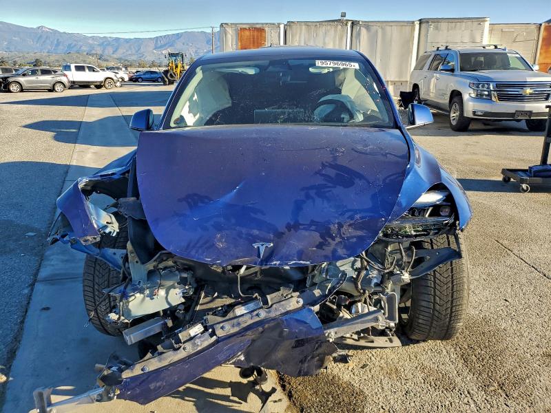 Photo 5 from auction – 2022 TESLA MODEL Y with VIN 7SAYGDEF8NF492937