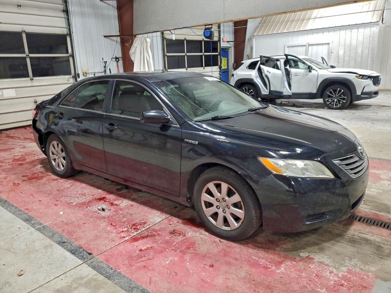 Photo 4 from auction – 2007 TOYOTA CAMRY HYBR with VIN JTNBB46K473035891
