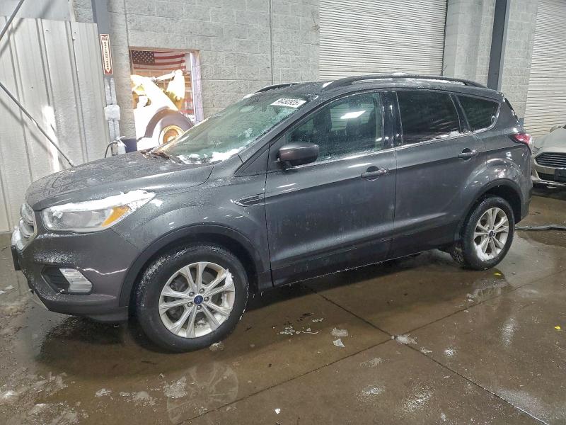 FORD ESCAPE SE 2018 with VIN 1FMCU9GD3JUB75458 - Photo from auction