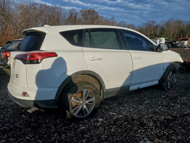 Photo 3 from auction – 2018 TOYOTA RAV4 with VIN 2T3RFREV3JW800738