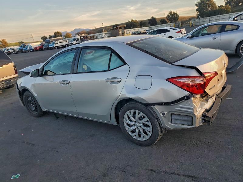 Photo 2 from auction – 2019 TOYOTA COROLLA L with VIN 5YFBURHE2KP879933