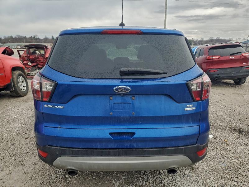 Photo 6 from auction – 2017 FORD ESCAPE SE with VIN 1FMCU9G99HUB76779
