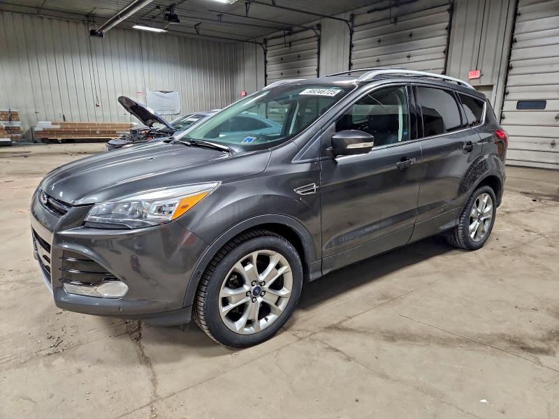 FORD ESCAPE TIT 2015 with VIN 1FMCU9J91FUB03704 - Photo from auction