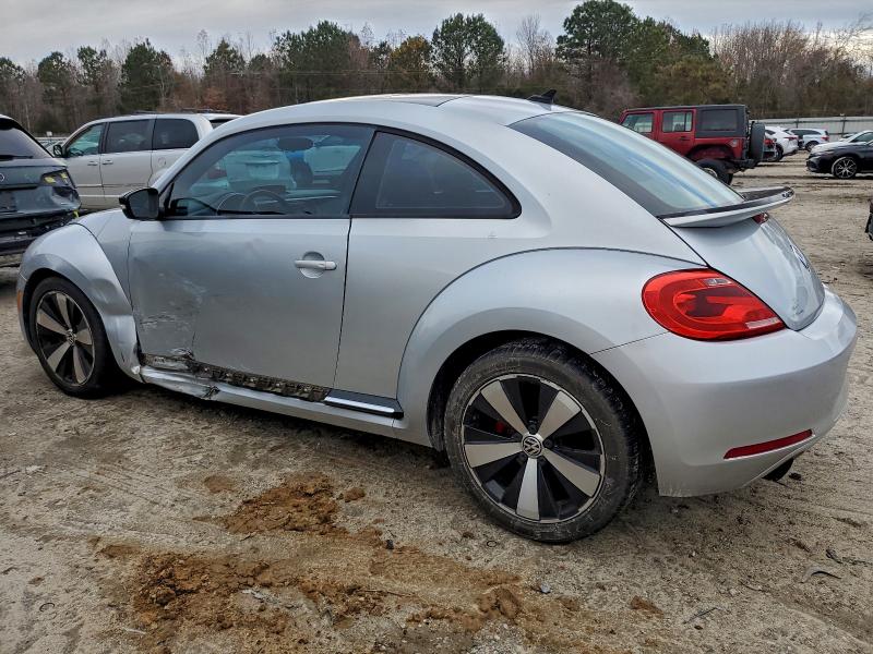 Photo 2 from auction – 2012 VOLKSWAGEN BEETLE TUR with VIN 3VWVA7AT0CM651132