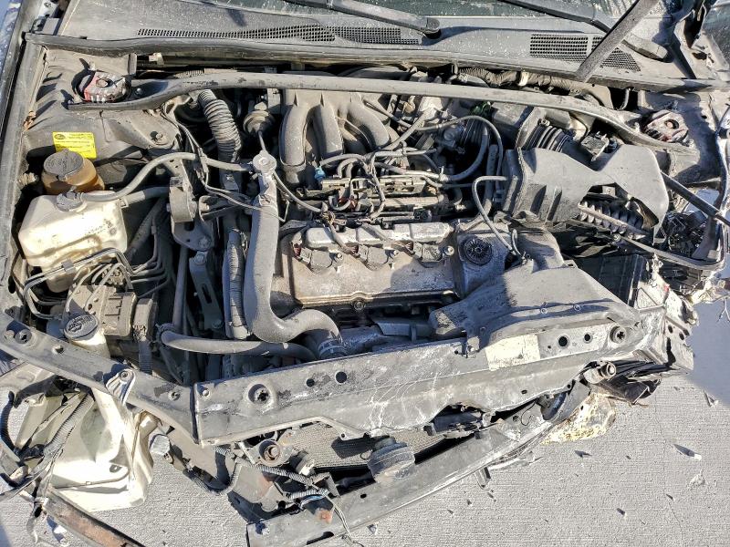Photo 11 from auction – 2003 TOYOTA CAMRY LE with VIN 4T1BF32K53U048450