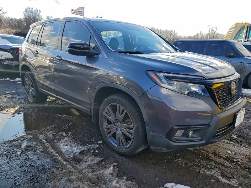 Photo 4 from auction – 2021 HONDA PASSPORT E with VIN 5FNYF8H55MB042316
