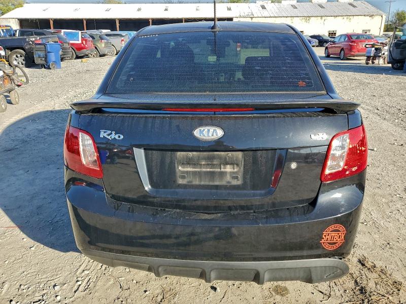 Photo 6 from auction – 2011 KIA RIO BASE with VIN KNADH4A39B6851639