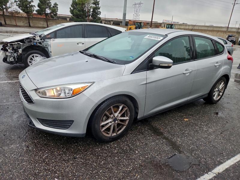 FORD FOCUS SE 2015 with VIN 1FADP3K24FL301056 - Photo from auction