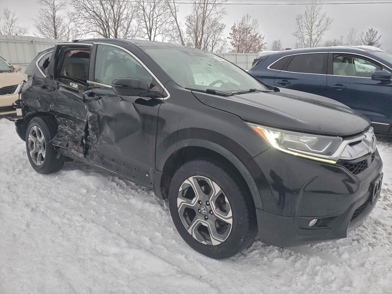Photo 4 from auction – 2017 HONDA CR-V EX with VIN 2HKRW2H59HH607305