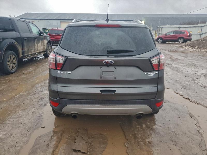 Photo 6 from auction – 2017 FORD ESCAPE with VIN 1FMCU9JD9HUF03713