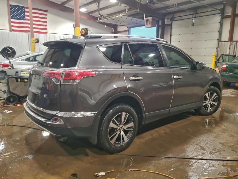 Photo 3 from auction – 2017 TOYOTA RAV4 XLE with VIN JTMRFREVXHJ712391