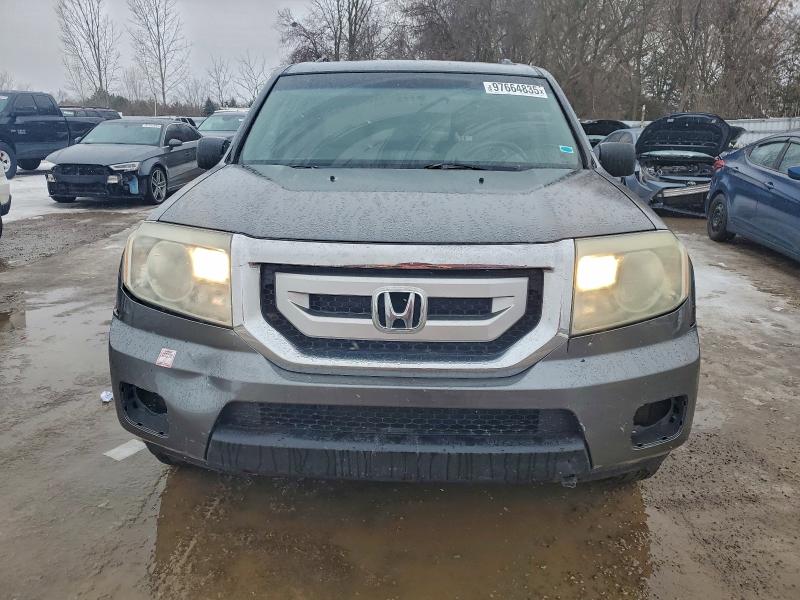 Photo 5 from auction – 2011 HONDA PILOT LX with VIN 5FNYF4H21BB501868
