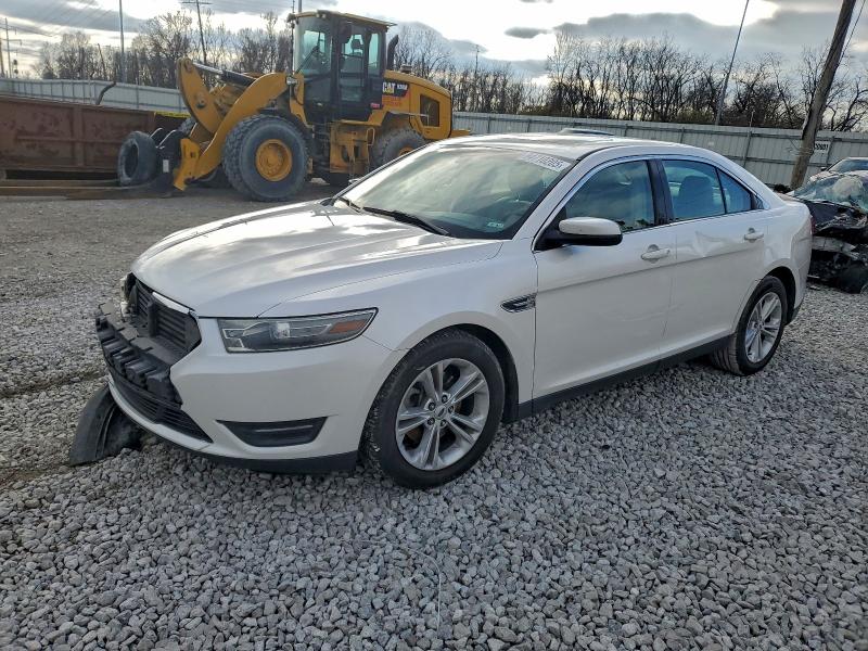 FORD TAURUS SEL 2014 with VIN 1FAHP2E80EG100290 - Photo from auction