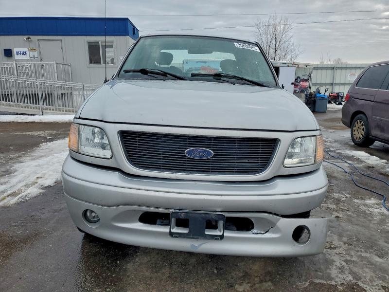 Photo 5 from auction – 2003 FORD F150 with VIN 2FTRX18W03CA82598