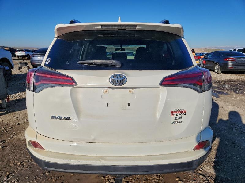 Photo 6 from auction – 2016 TOYOTA RAV4 LE with VIN JTMBFREV7GJ065268