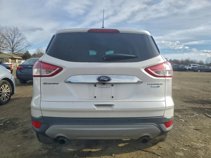 Photo 6 from auction – 2016 FORD ESCAPE TIT with VIN 1FMCU9JX9GUC48568