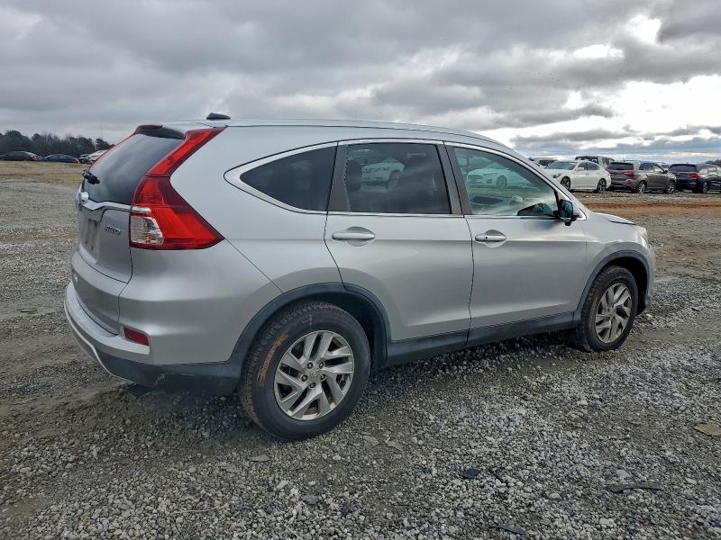 Photo 3 from auction – 2016 HONDA CR-V EXL with VIN 5J6RM4H7XGL028508
