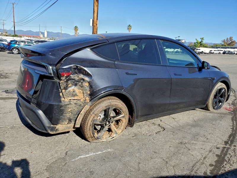 Photo 3 from auction – 2026 TESLA MODEL Y with VIN 7SAYGDED9TF522328
