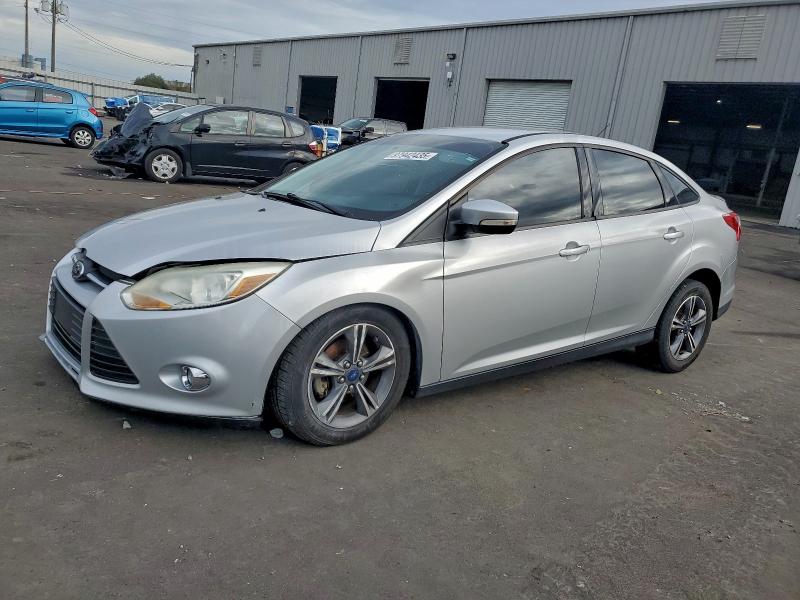 FORD FOCUS SE 2014 with VIN 1FADP3F26EL216406 - Photo from auction