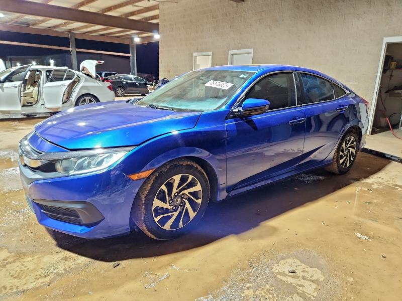 HONDA CIVIC EX 2018 with VIN 19XFC2F75JE010761 - Photo from auction