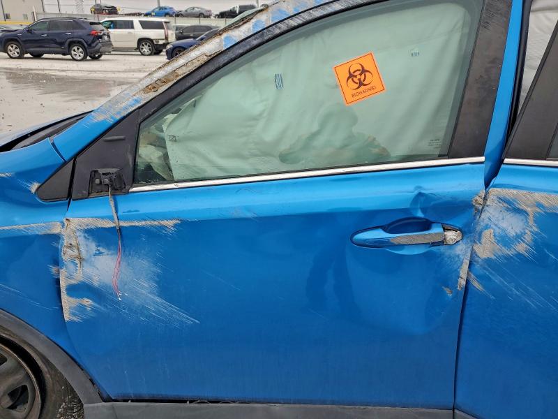 Photo 7 from auction – 2018 TOYOTA RAV4 LE with VIN 2T3BFREV8JW739436