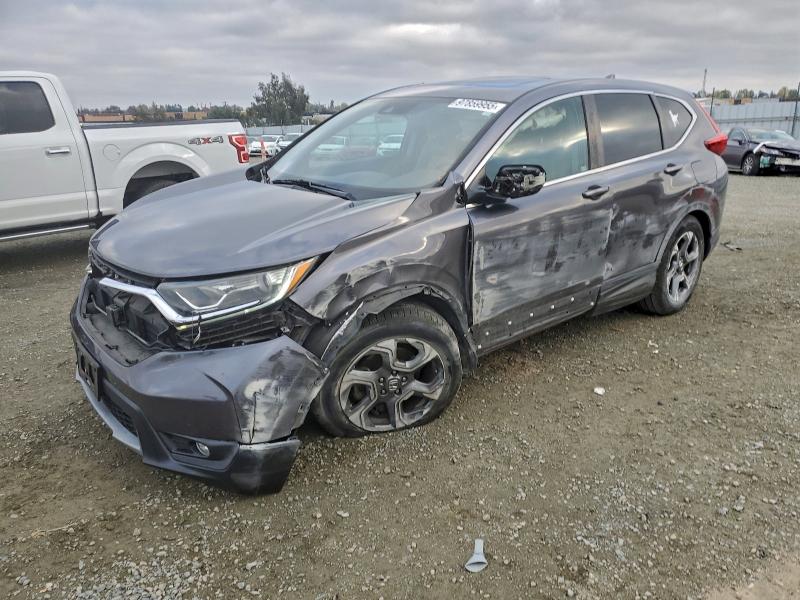 HONDA CR-V EX 2018 with VIN 5J6RW1H55JA004921 - Photo from auction