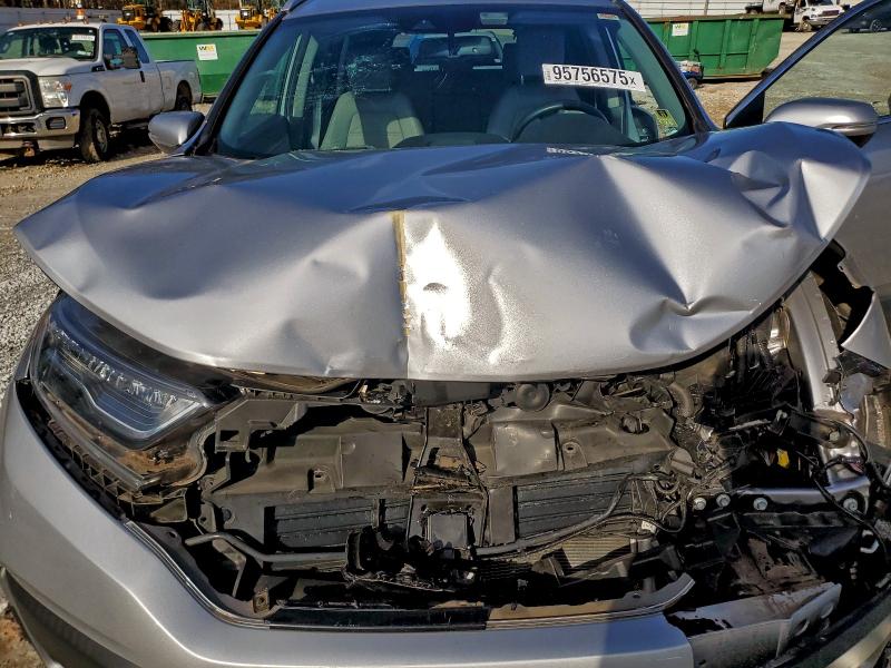 Photo 11 from auction – 2022 HONDA CR-V with VIN 5J6RT6H80NL030840