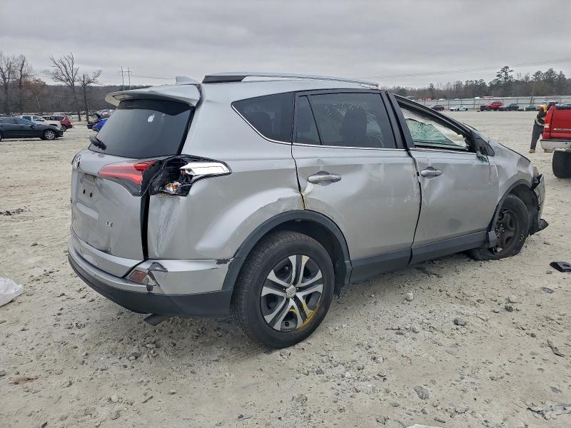 Photo 3 from auction – 2018 TOYOTA RAV4 with VIN JTMZFREV9JJ185580