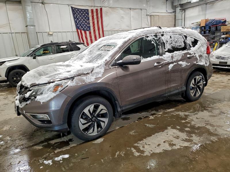HONDA CR-V TOURI 2016 with VIN 5J6RM4H93GL095923 - Photo from auction