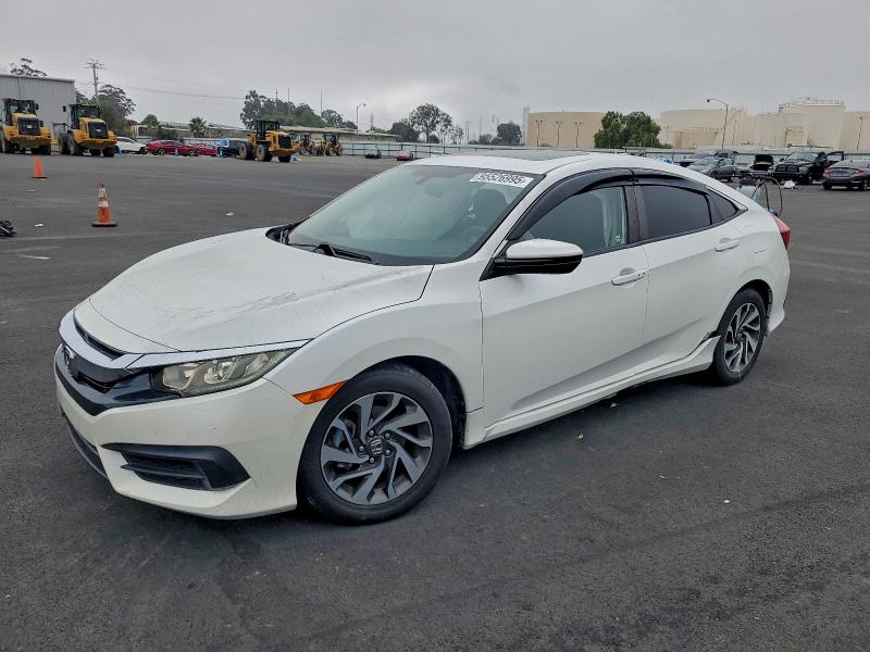 HONDA CIVIC EX 2017 with VIN 19XFC2F7XHE228530 - Photo from auction